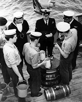 Images Dated 22nd June 2004: Up Spirits on HMS Cleopatra, 1953