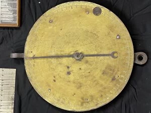 Moved Collection: Spring balance brass dial, Samuel Cody Archive