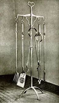 Stand of fire irons in polished wrought iron