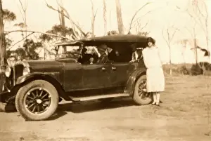 Standing alongside large saloon
