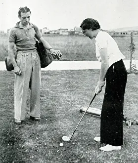 Matthews Prints: Stanley Matthews and wife playing golf in Rhyl