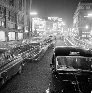 Images Dated 1st June 2007: Stationary traffic along a busy Piccadilly at night