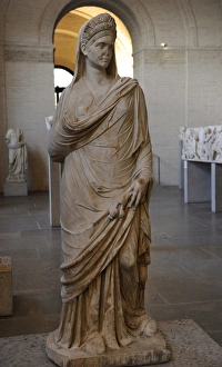 Images Dated 29th December 2012: Statue of a woman, holding ears of corn and poppis. About 11