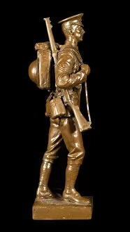 Statuette of British soldier in marching order, WW1
