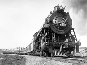 Curve Prints: A steam engine on the American railway rounding a curve