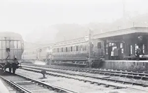 Steam locomotive shunting carriages to platform