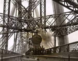 Images Dated 24th August 2018: Steam train powering over the Forth Bridge