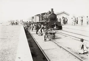 Steam train in a station, China, c. 1910
