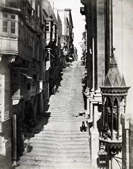 Steps up Strada St Giovanni street in Valletta Malta