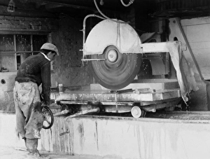 Images Dated 12th March 2012: Stonemason Cutting Stone