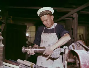 Polished Prints: Stonemason working with granite in a workshop