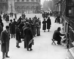 Street artist outside St Martin in the Fields, 1937