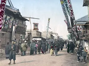 Yokohama Prints: Street with banners, Yokohama, Japan circa 1880s. Date: circa 1880s