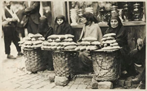 Street Bread sellers outside the Baker's shop - Istanbul Market - Istanbul, Turkey. Date: 1922