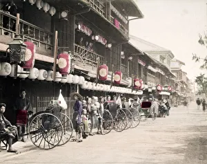 Street filled with rickshaws, jinrikishas, Japan, c. 1890 s