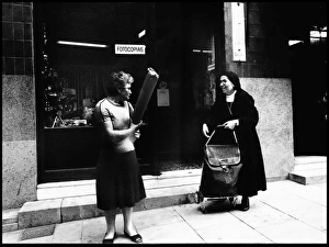 Images Dated 30th August 2016: Street meeting with nun, Valencia, Spain