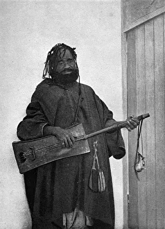 Images Dated 4th December 2017: Street Minstrel, Tangier, Morocco