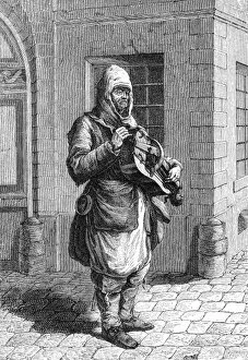 Images Dated 13th October 2011: Street music: hurdy gurdy player in Paris