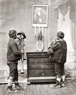 Madonna Prints: Street musicians honouring a Madonna, Italy, c. 1880 s