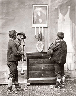 Street musicians honouring a Madonna, Italy, c.1880's