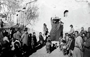 Street puppet show, China, early 1900s