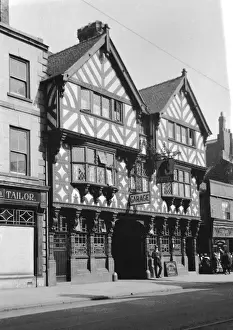 Oriel Prints: Street scene with Nags Head Hotel