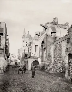 Defensive Structure Prints: Street scene in Old Cairo with mosque and minarets