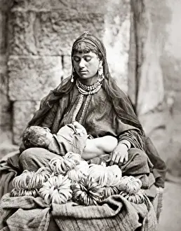 Vendor Prints: Street vendor and baby, Egypt, circa 1880s