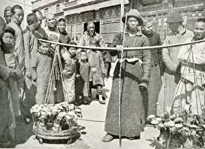 Street vendor selling artificial flowers, China, East Asia