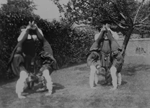 Pairs Prints: Student pairs doing handstands