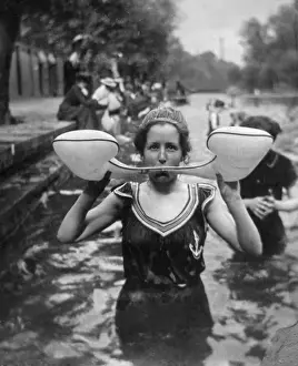 Student with water wings swimming and fashion
