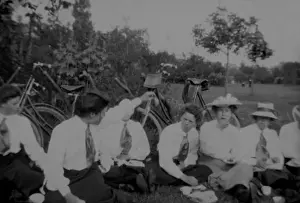 Bpeosa Prints: Students with bicycles having a picnic