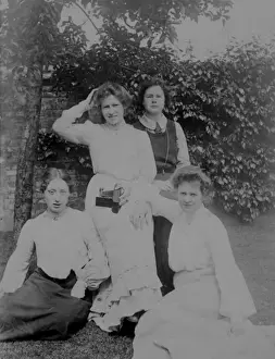 Students in ordinary clothes with camera