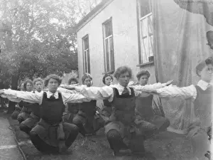 Students outside doing squats