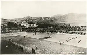 Students playing American football, University Campus