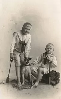 Russell Gallery: Studio portrait, two boys with Jack Russell terrier