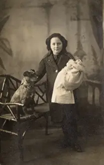 Devonport Prints: Studio portrait, girl with dog and doll