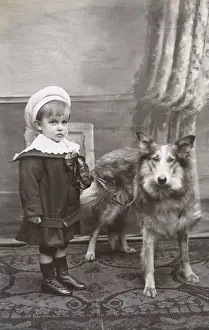 Collars Prints: Studio portrait, little boy with a dog