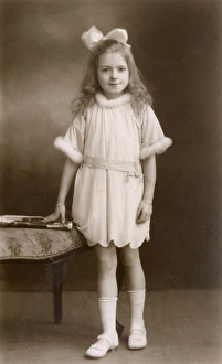 Images Dated 31st March 2017: Studio portrait, little girl in party dress