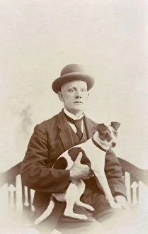 Russell Gallery: Studio portrait, man with Jack Russell terrier