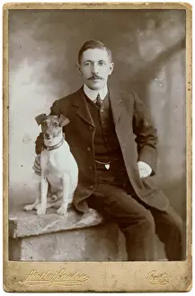 Russell Prints: Studio portrait, man with Jack Russell terrier dog