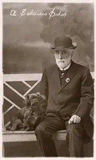 Pinstripe Prints: Studio portrait, man with Pekingese dog