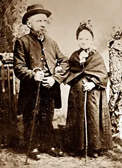 Studio portrait of married midget couple, early 1900s