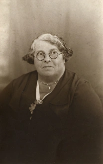 Images Dated 31st March 2017: Studio portrait, middle-aged woman in glasses