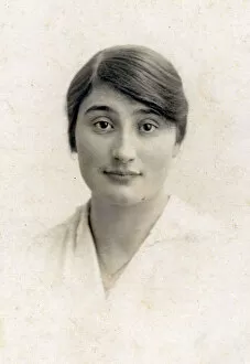 Studio portrait photograph of a young woman