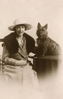 Scottie Prints: Studio portrait, woman with Scots terrier