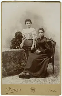 Poodles Prints: Studio portrait, two women with poodle dog