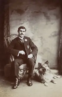 Buttonhole Prints: Studio portrait, young man with his dog