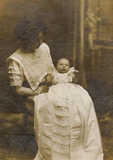 Images Dated 31st March 2017: Studio portrait, young mother and baby