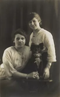 Images Dated 31st March 2017: Studio portrait, two young women with dog